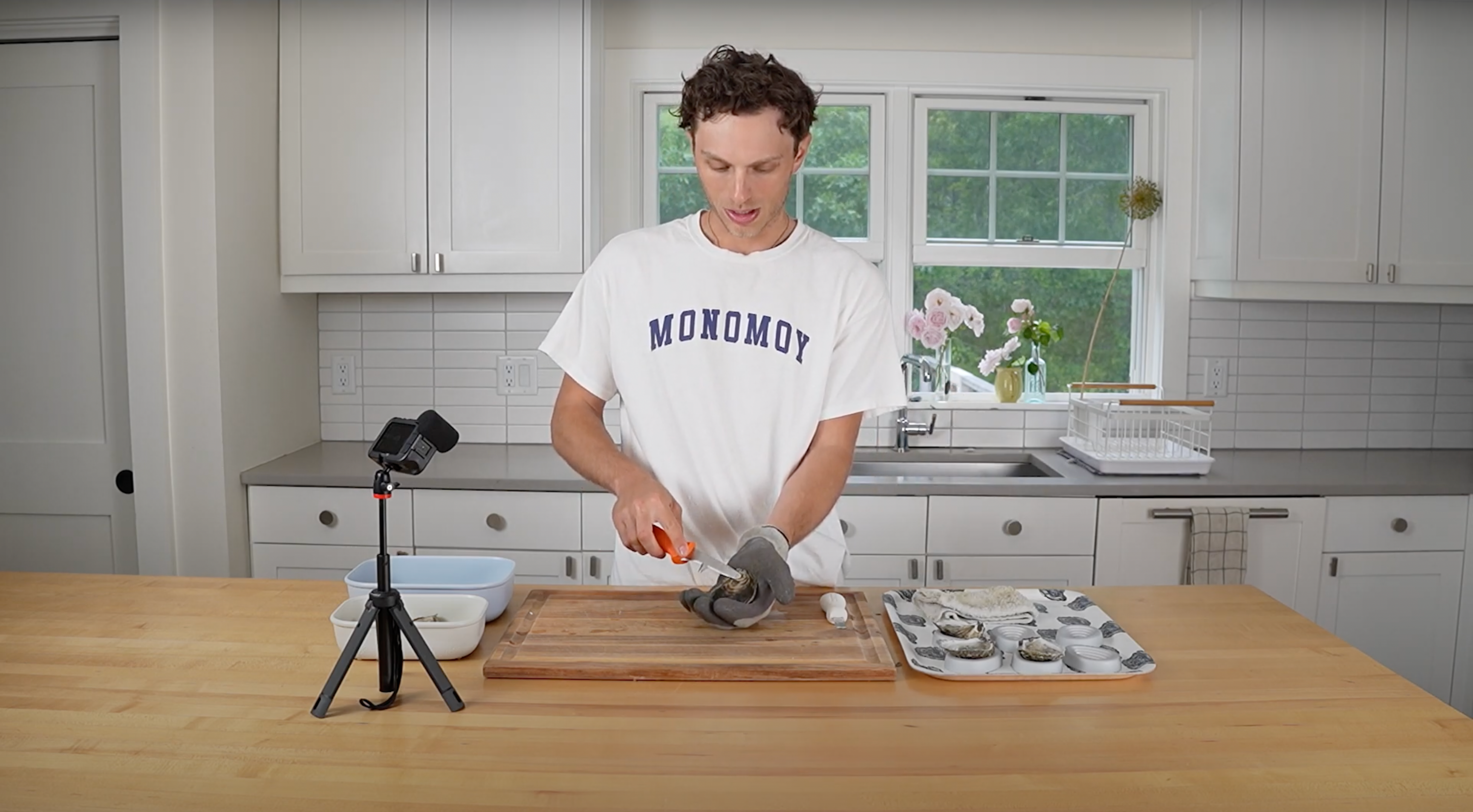 Video thumbnail showing side-by-side comparison of the OCK Oyster Knife versus a standard oyster knife, demonstrated at a kitchen counter for usability insights.